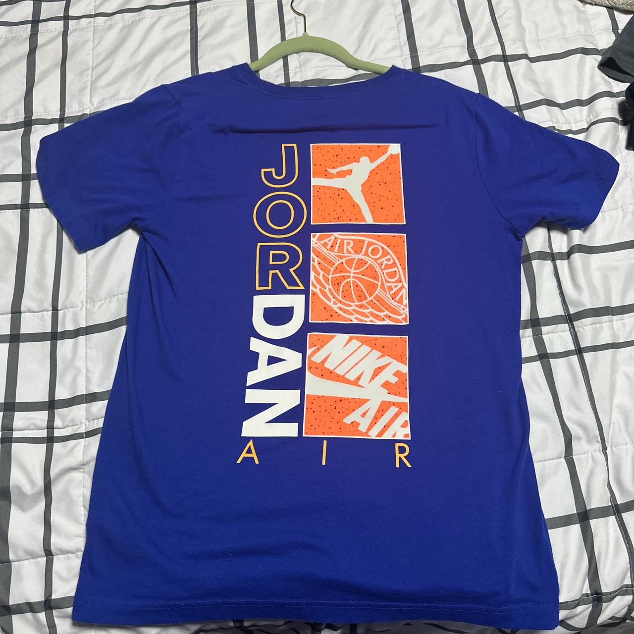 Dark blue and orange Jordan shirt