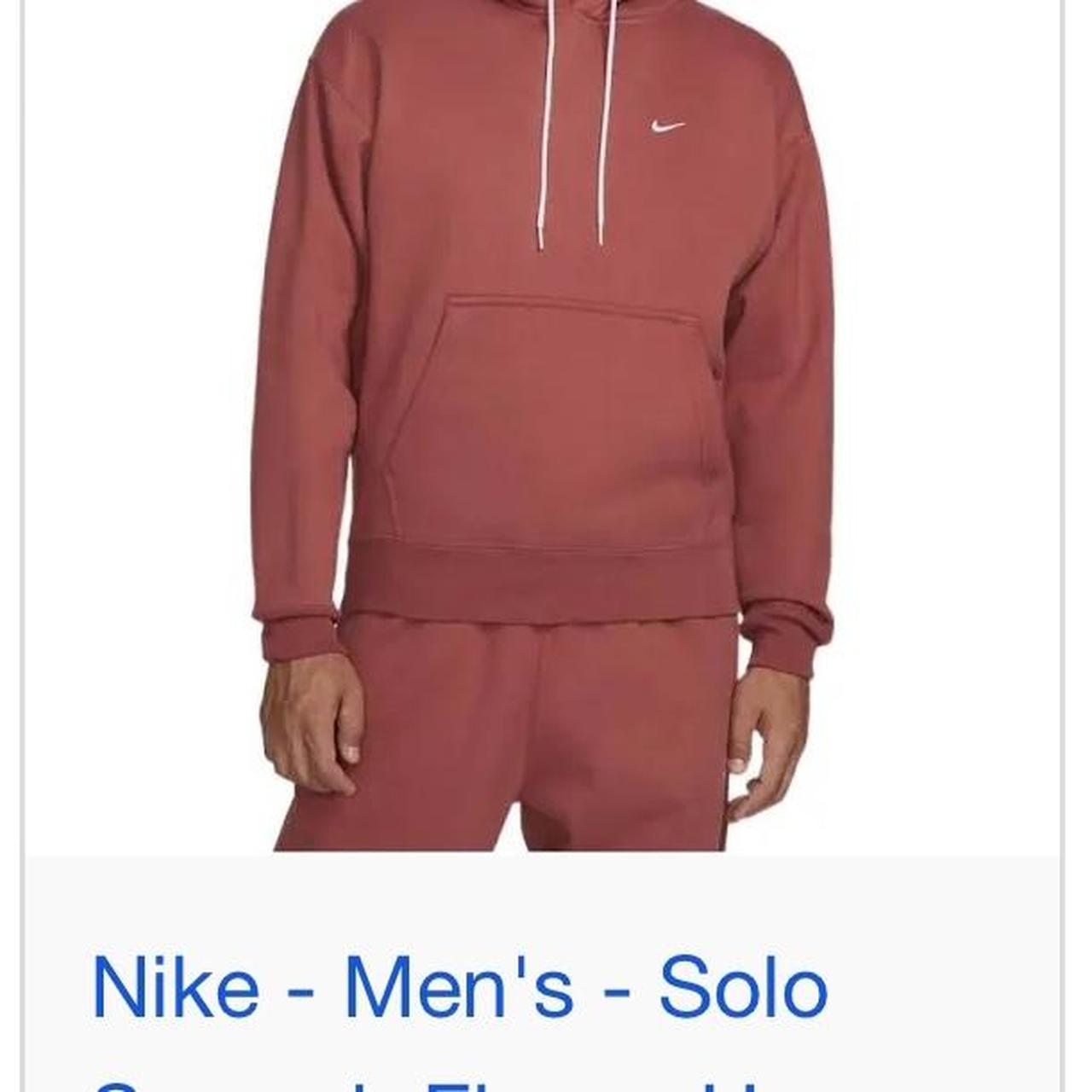 rust color nike sweatshirt