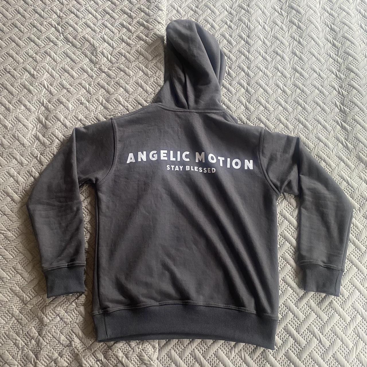 Grey angelic motion hoodie Small, tightfitted,... Depop