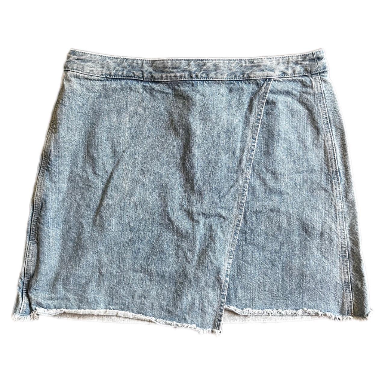 Light wash denim wrap skirt with a raw hem perfect. Depop