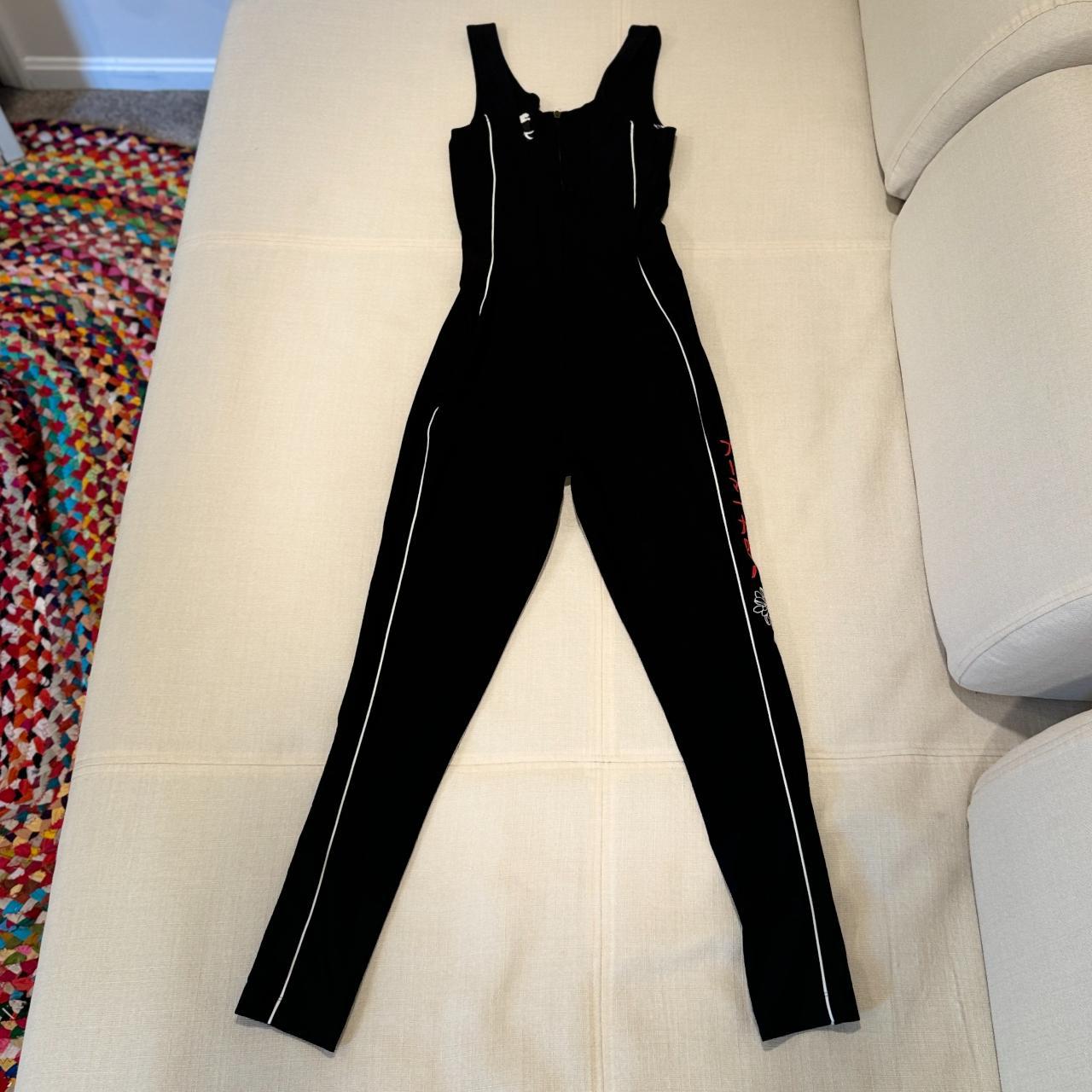 PUMA Black Stretchy Jumpsuit Size. Depop