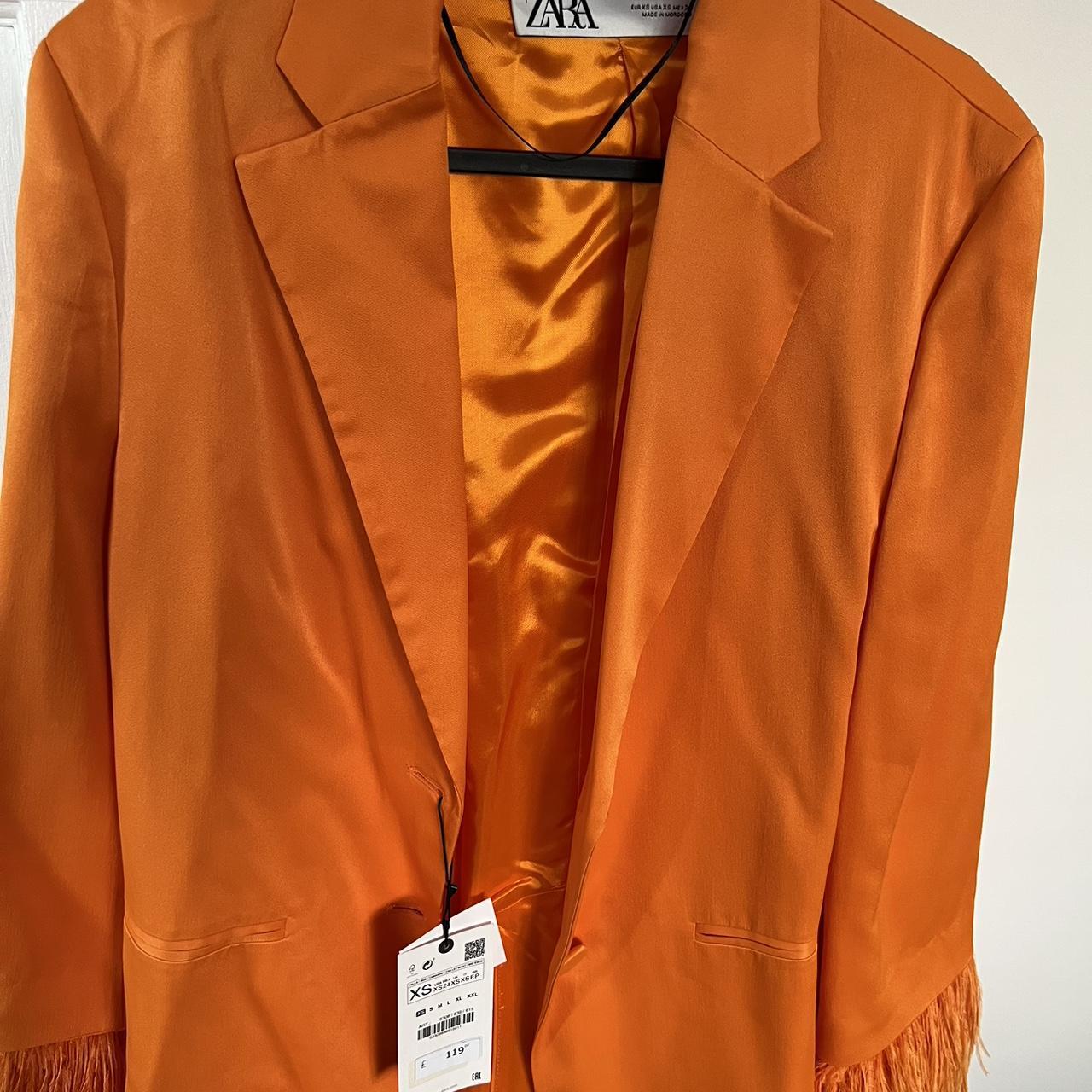 Zara orange blazer with feather on sleeves