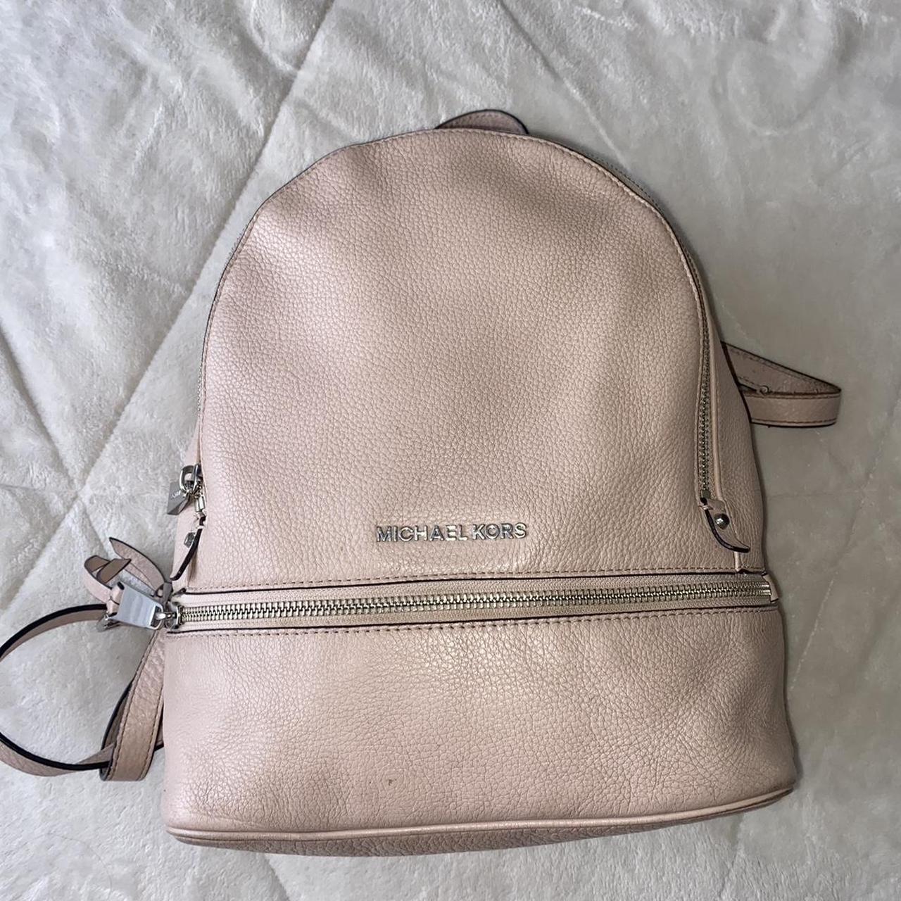 Michael Kors Baby pink backpack has been loved. Depop