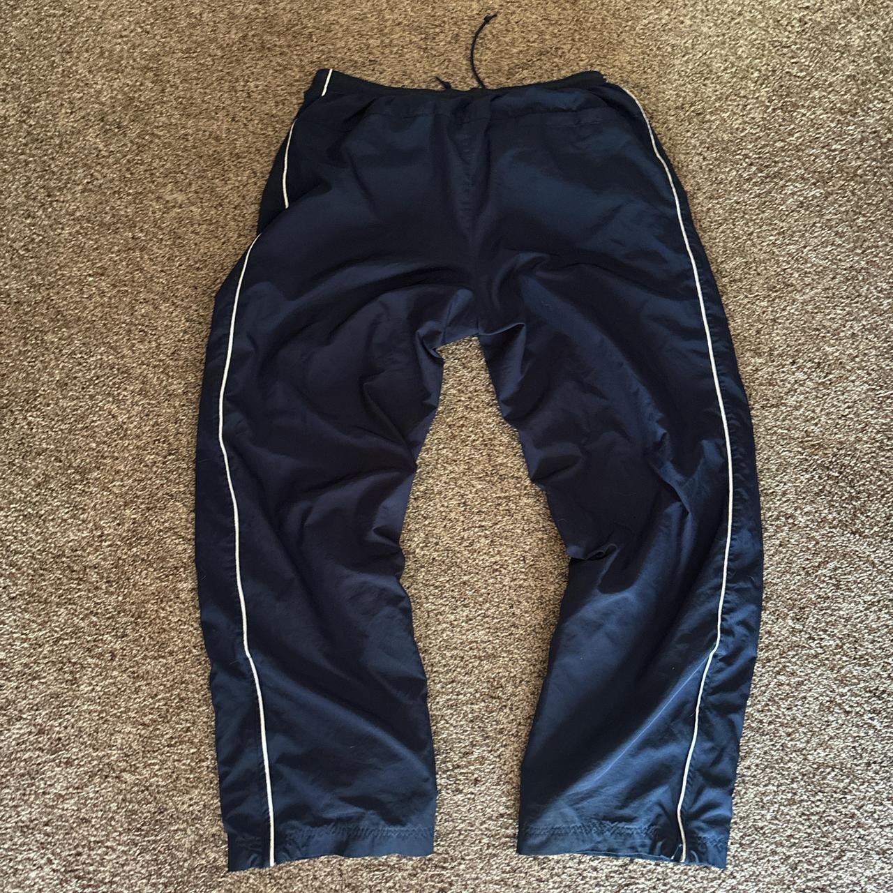 Vintage baggy Nike navy blue track pants... - Depop