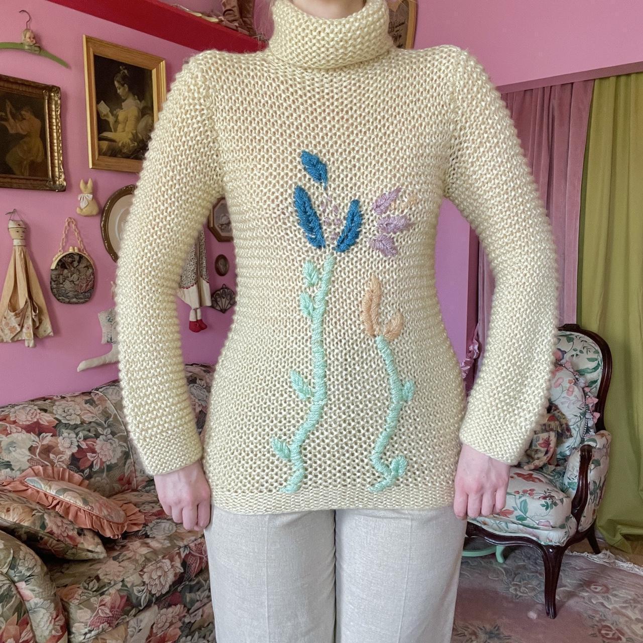 rare vintage knit sweater with embroidered flowers....