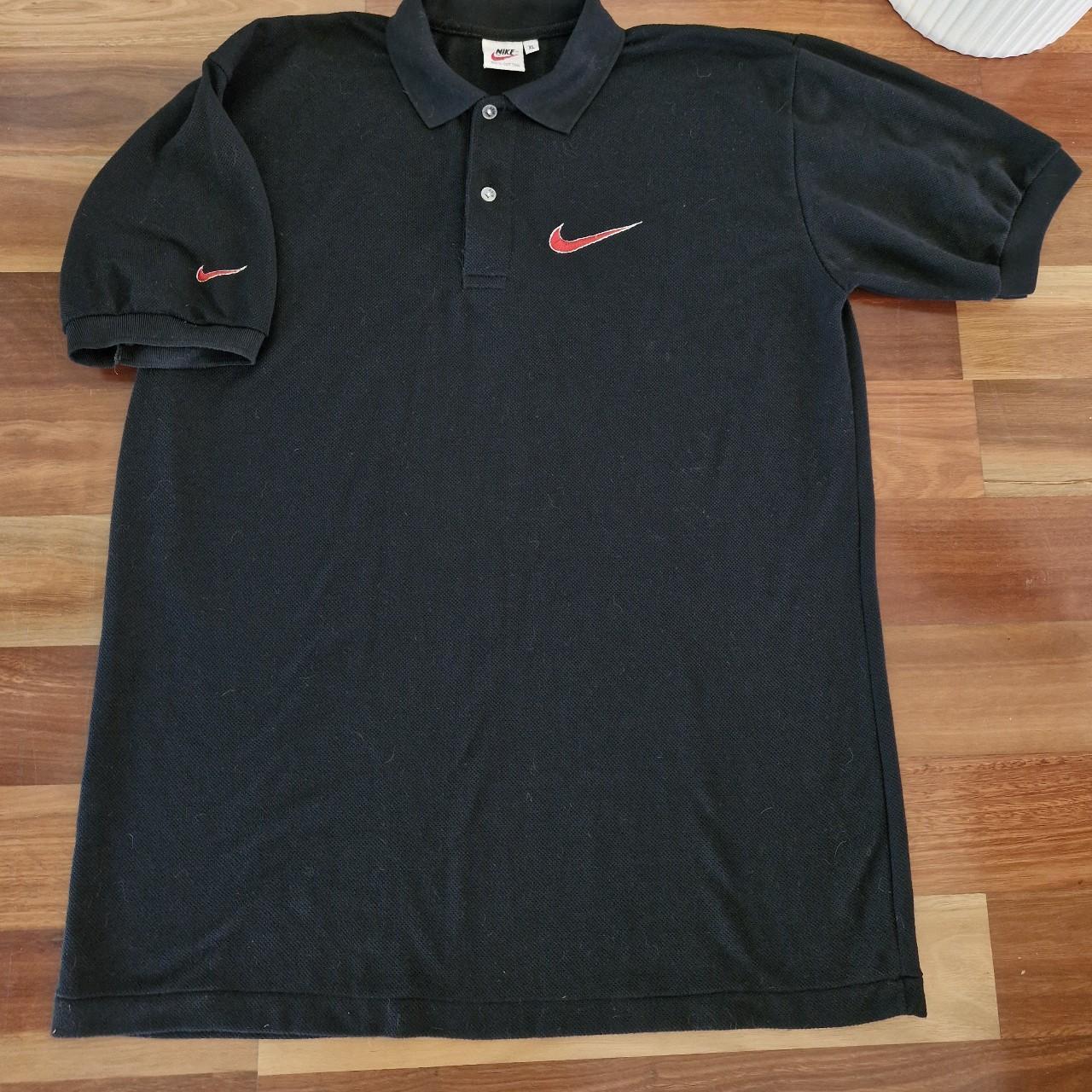 2000s vintage black nike polo with red tick - size... - Depop