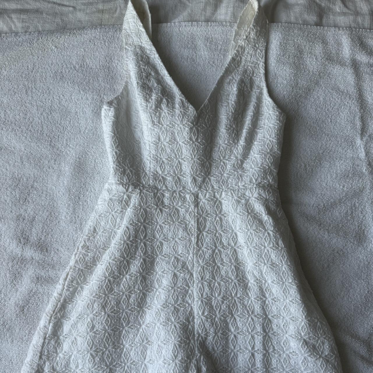 Cute white romper from KOOKAI Size 34 Depop