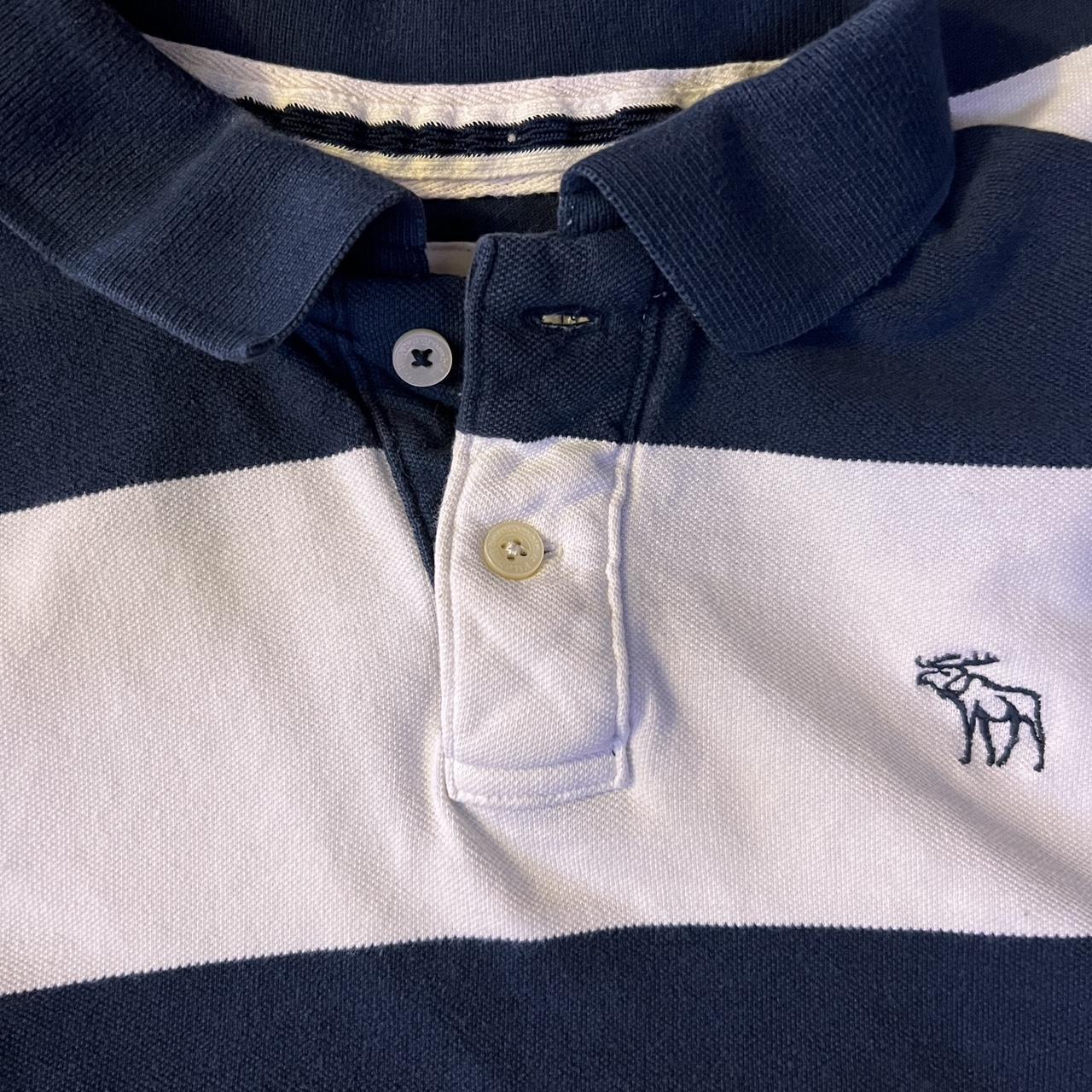 White Polo top with Navy and Maroon Abercrombie and fitch Patch