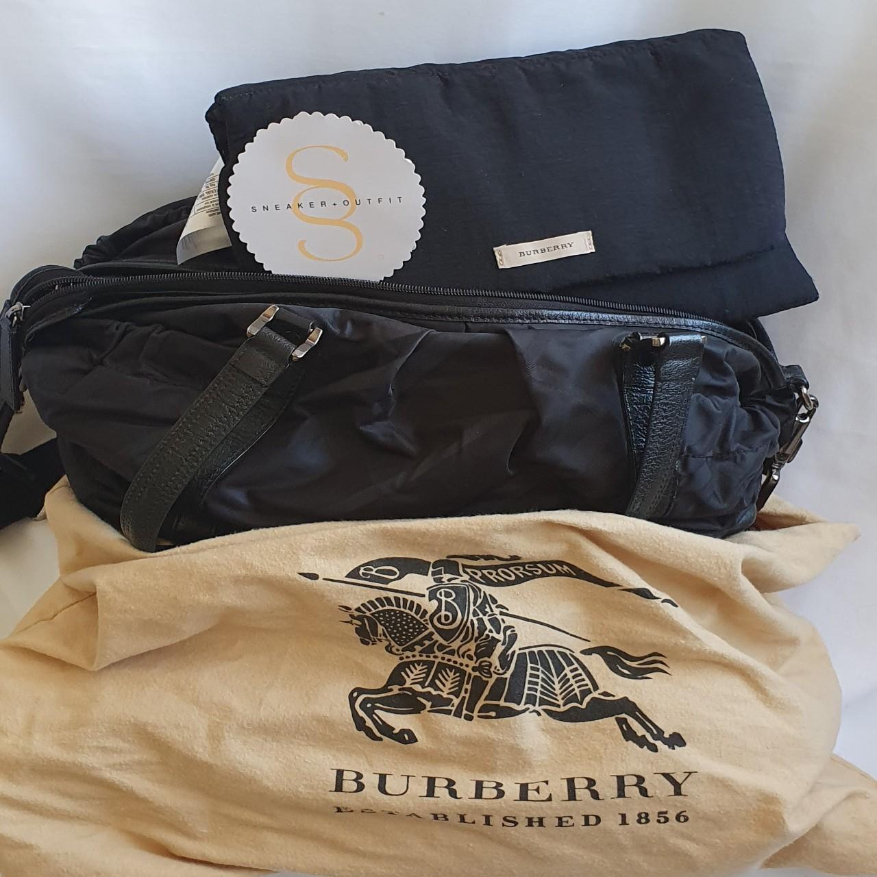 Burberry Nappy Bag in a used condition. Visible