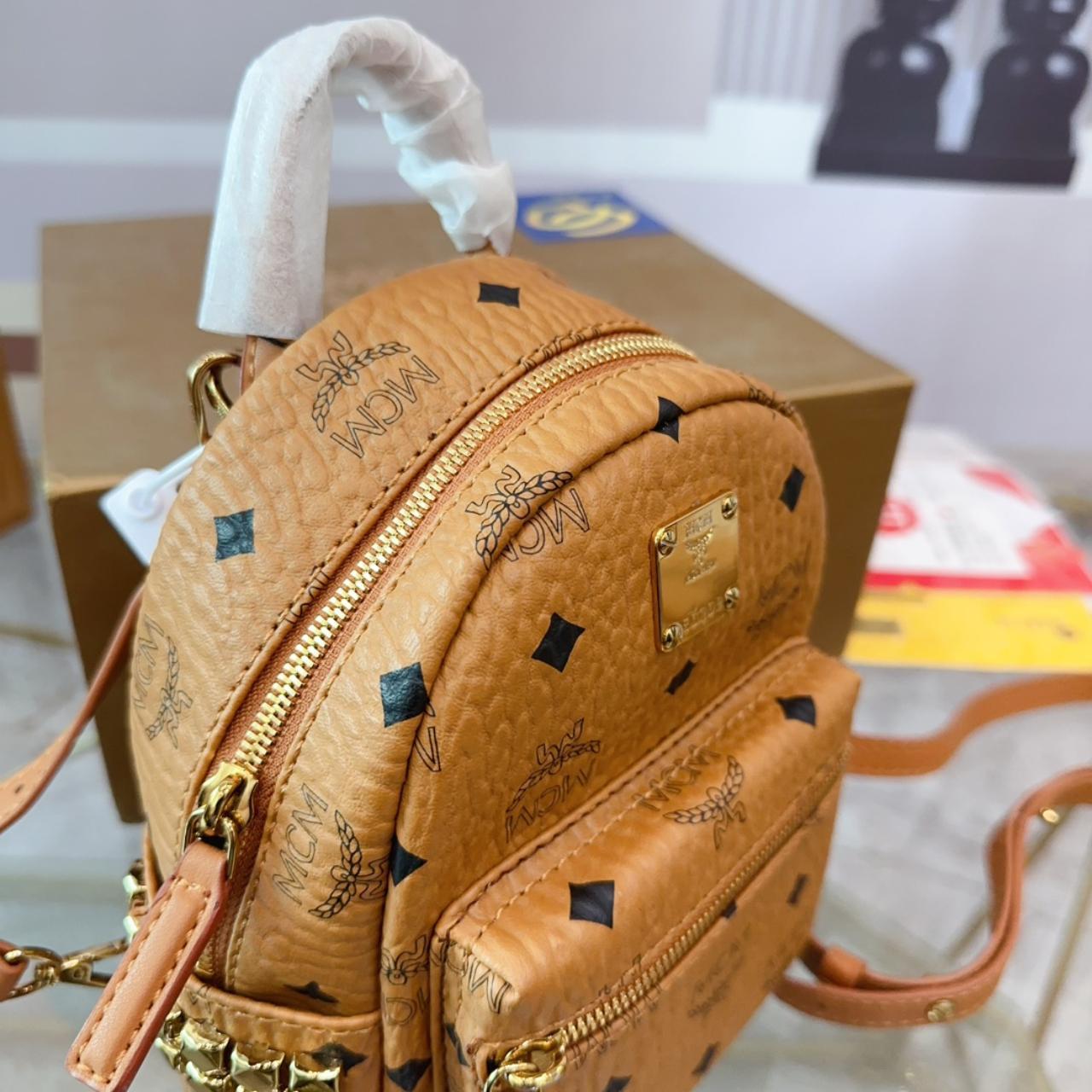 Original mcm backpack best sale