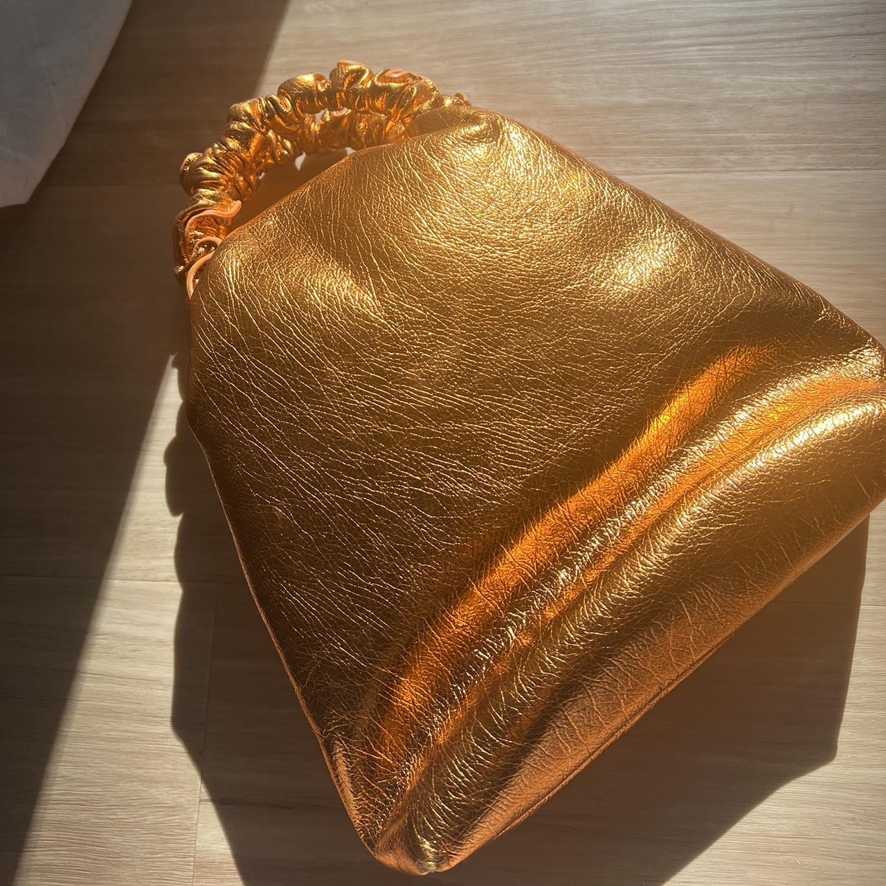 Cute orange shiny bag with ruffle handle and magnet