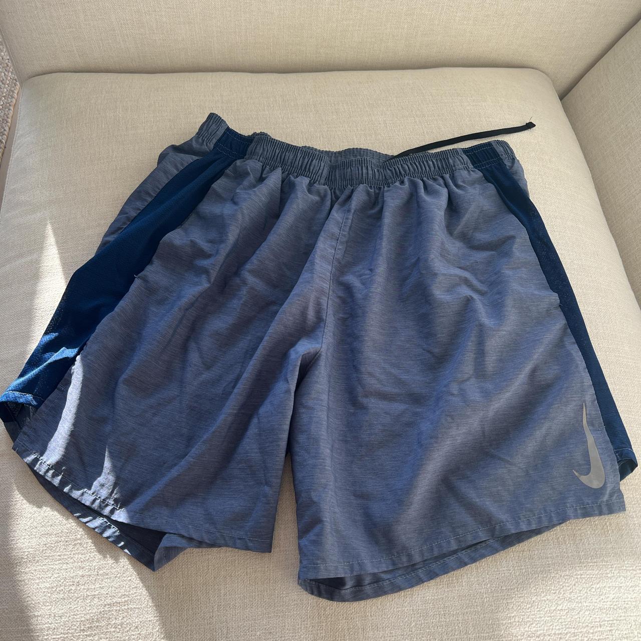 Blue men’s Nike shorts size Large. Cut out the liner - Depop