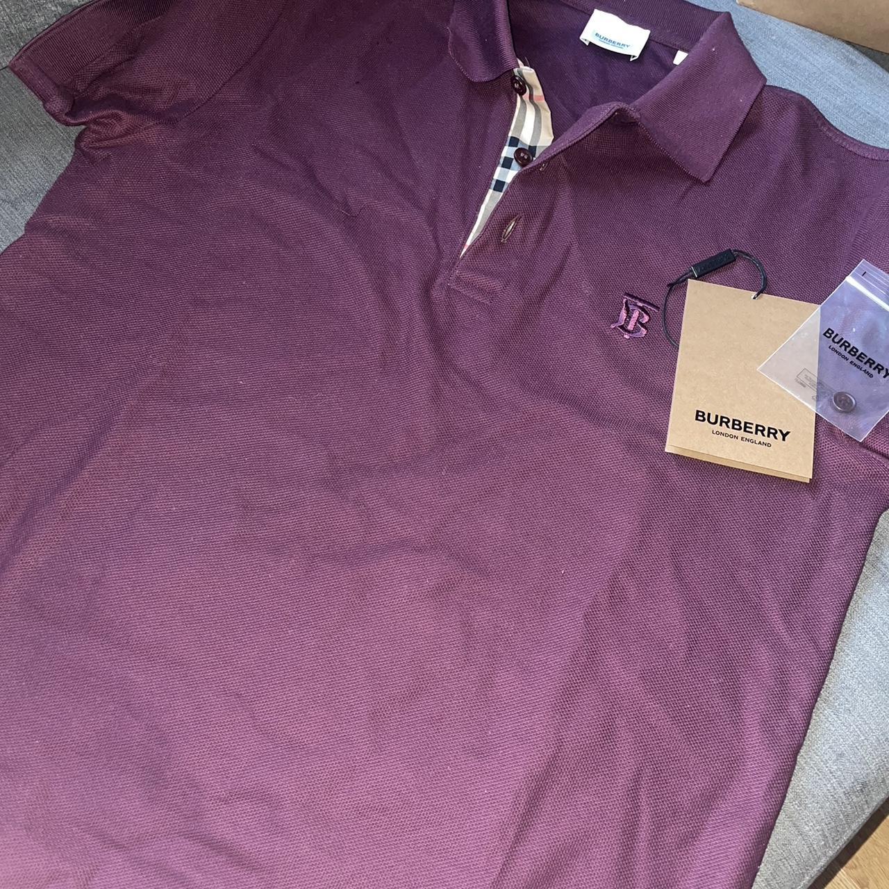 Burberry polo White marks are from Depop