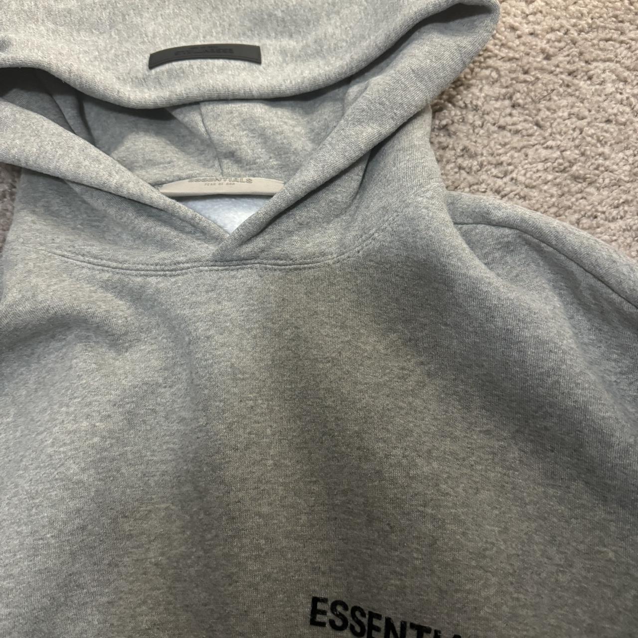 Small grey essential hoodie Only worn twice no flaws - Depop