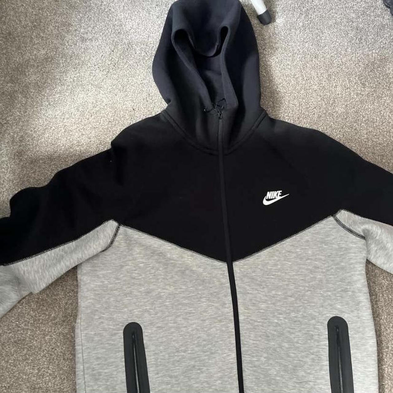 Nike tech fleece black and grey hoodie. Worn a few... - Depop