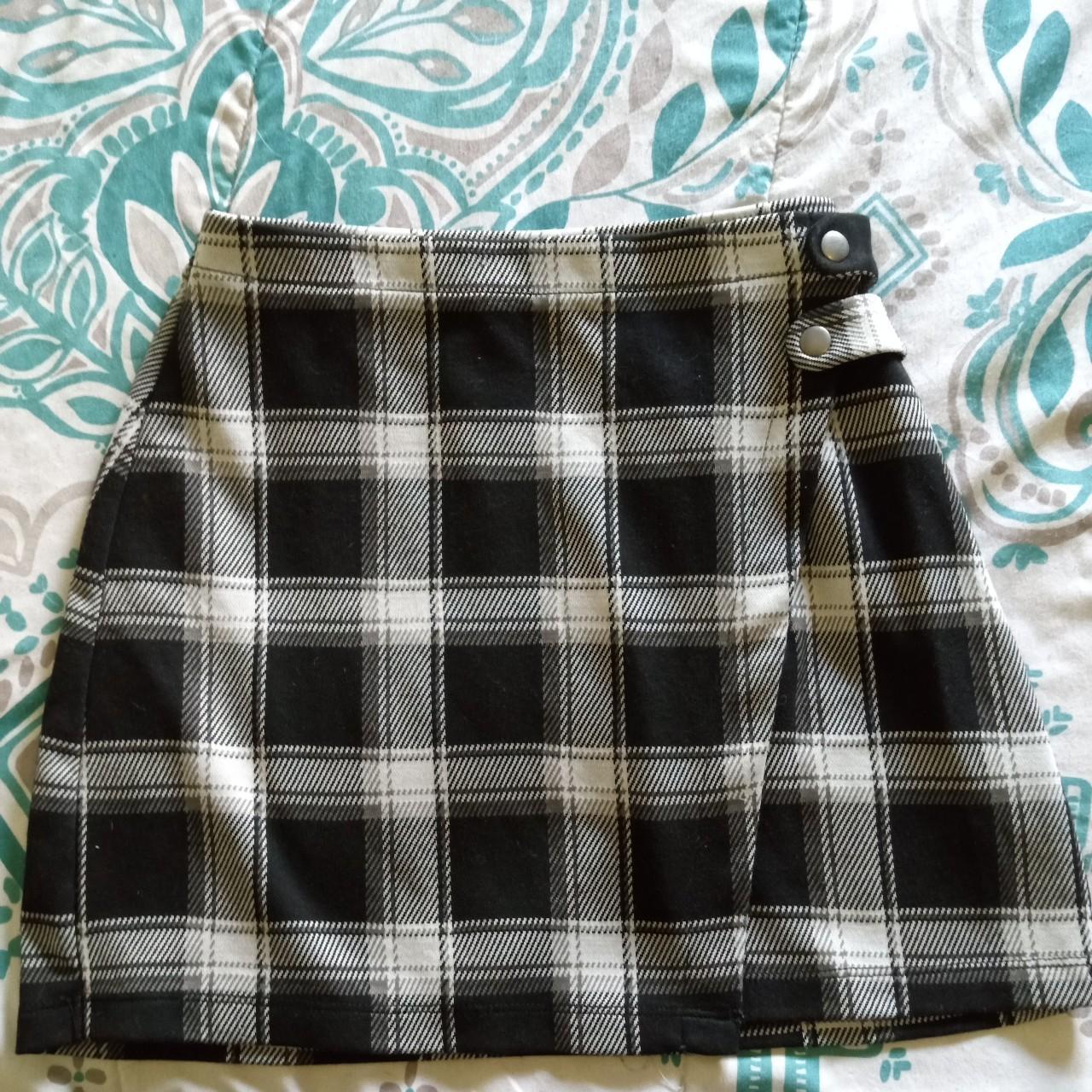 Cute plaid bodycon skirt with side strap detail. Depop