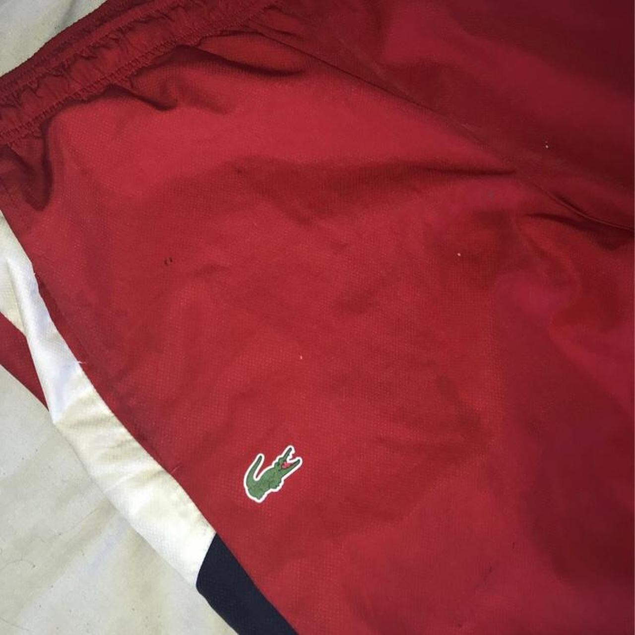 Dark Red lacoste baggies good condition Tiny burner... - Depop