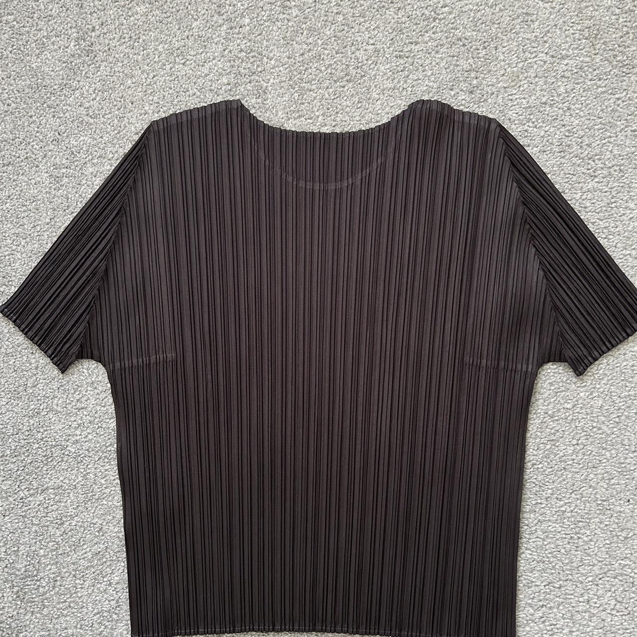 Off black pleats please issey Miyake top. Good... - Depop