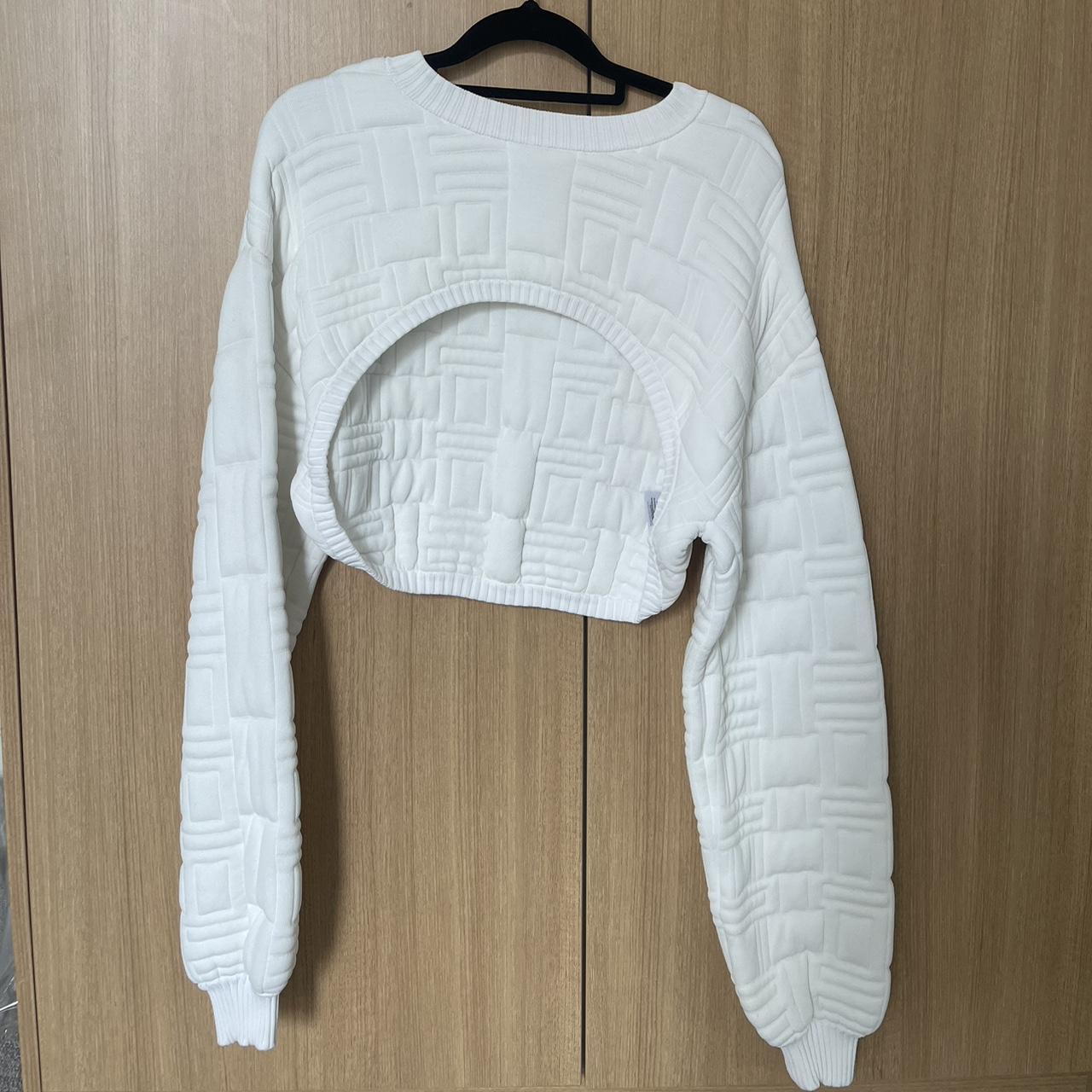 P.E Nation White cropped jumper with cut out detail. Depop