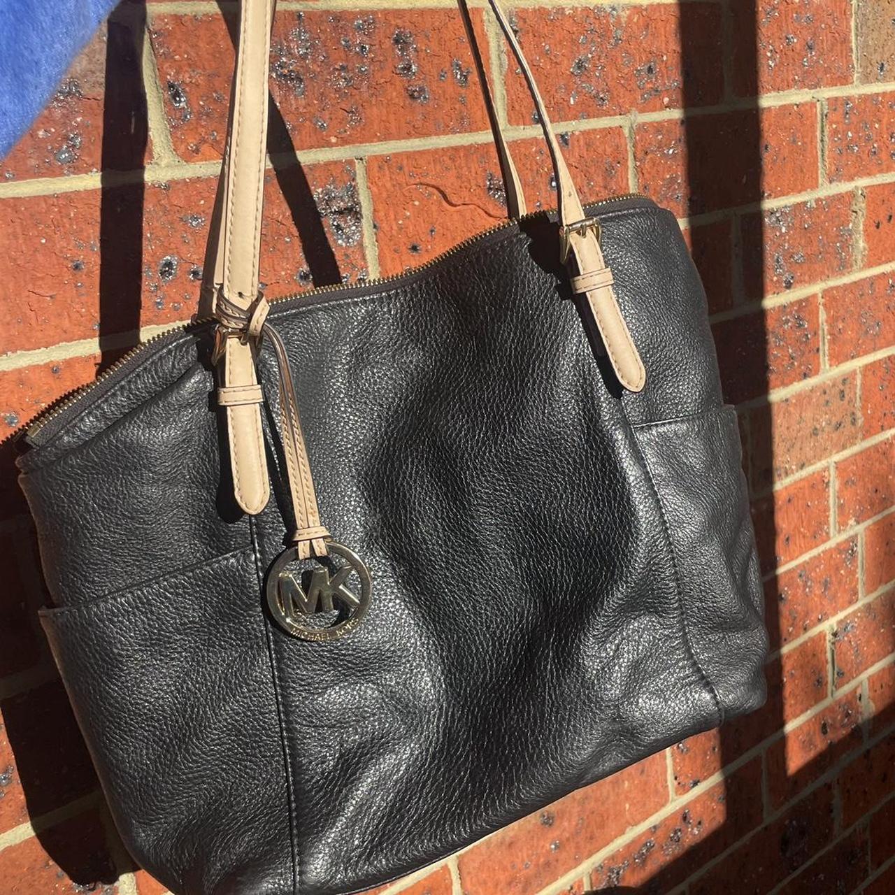 Michael Kors Handbag Black leather with tan. Depop