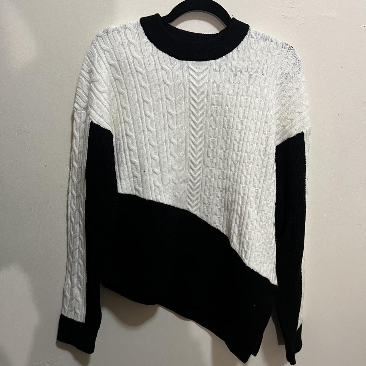 Express White and black angle cut sweater perfect. Depop