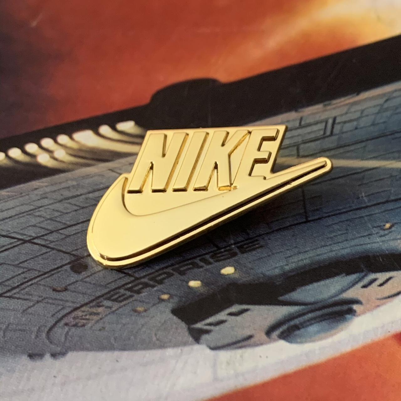 Gold nike pins hotsell