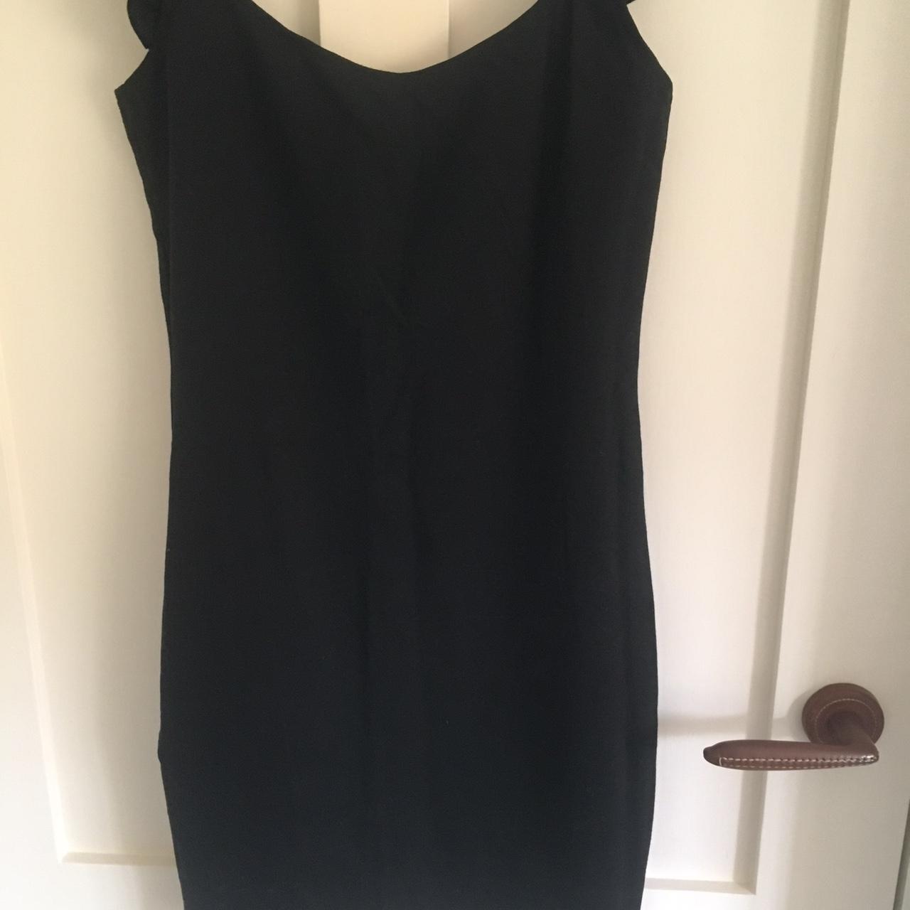Brandy Melville black bodycon dress with ruffle... Depop
