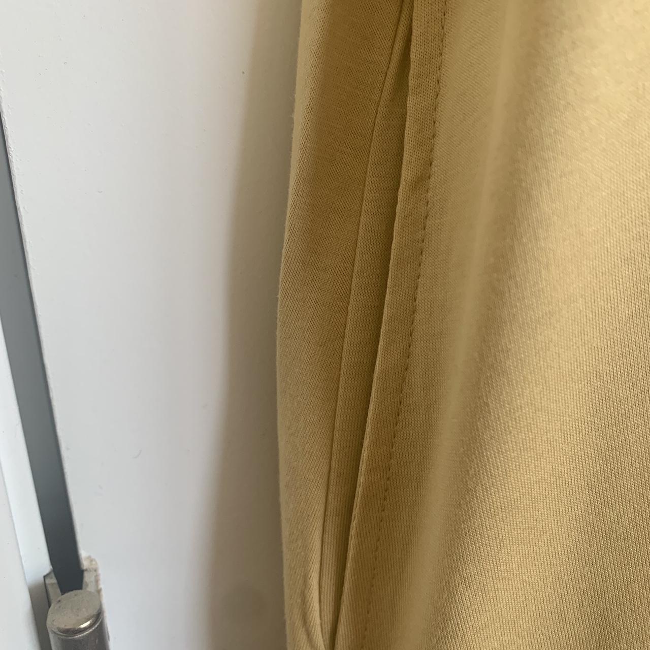 Uniqlo yellow womens mercerized v neck a line long Depop Uniqlo yellow womens mercerized v neck a line long Depop
