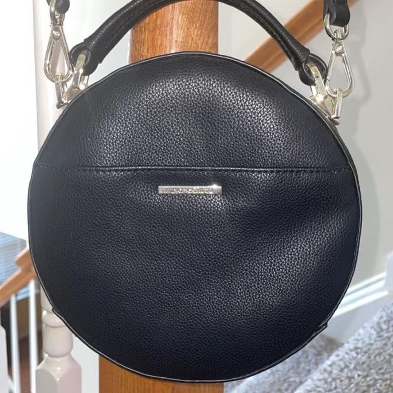 Vince Camuto black round leather purse a zipper. Depop