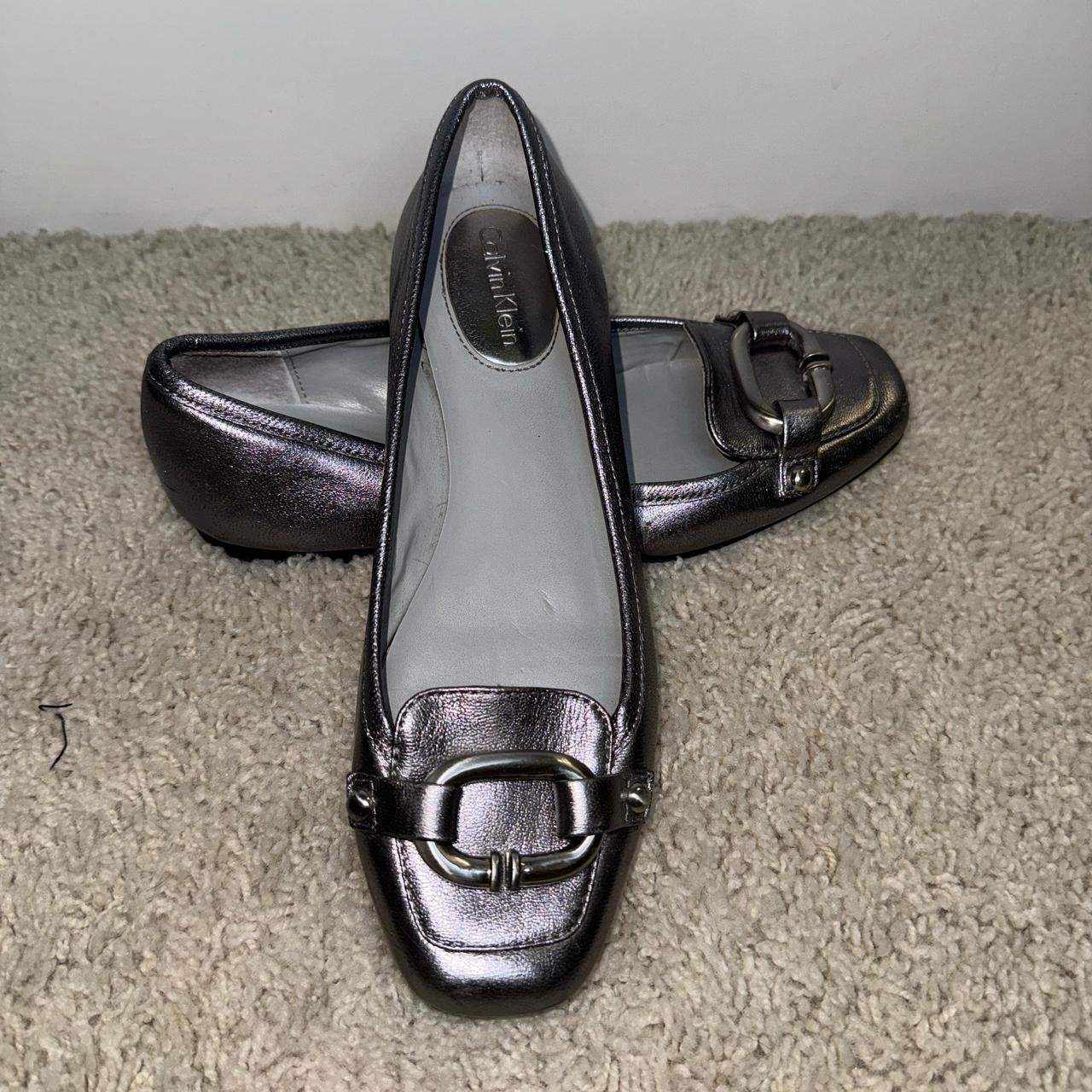 Calvin Klein Black and silver loafers with buckle