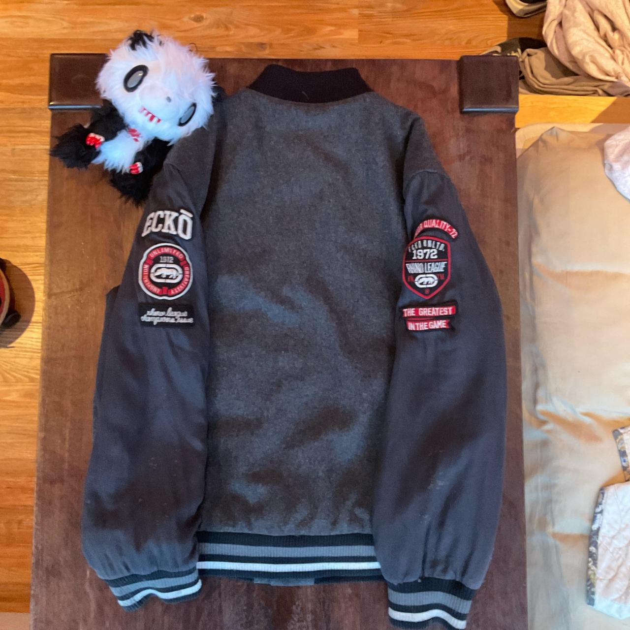 Black wool Marc Eckō Unltd. varsity-jacket} Found | Depop