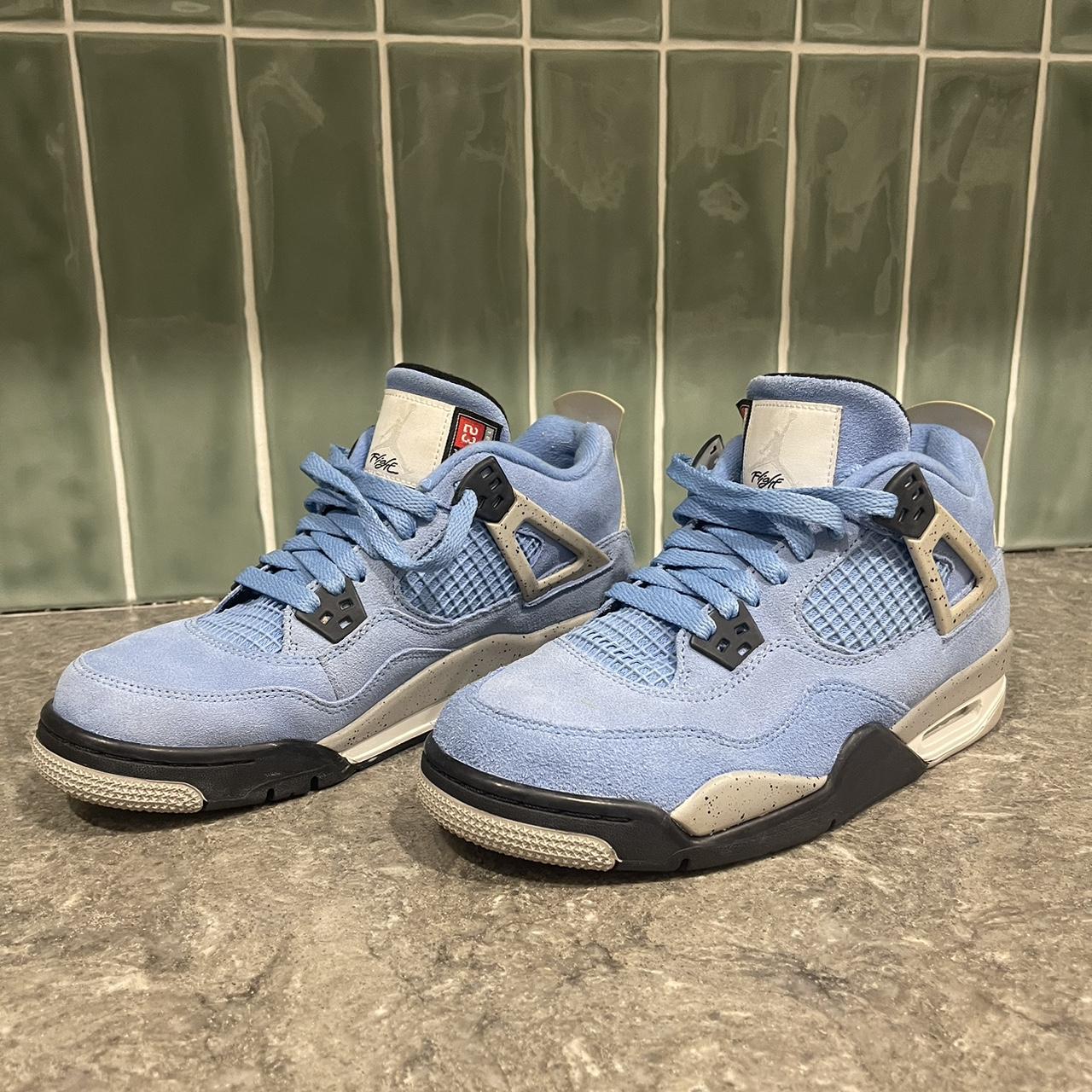 jordan 4 university blue on feet