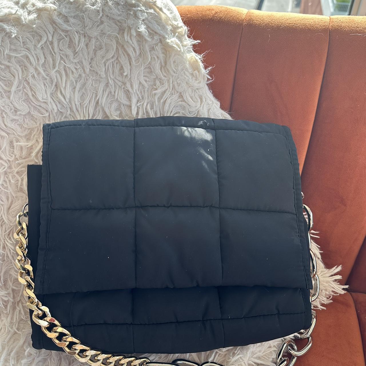 Black quilted puffer shoulder bag with mixed metal... Depop