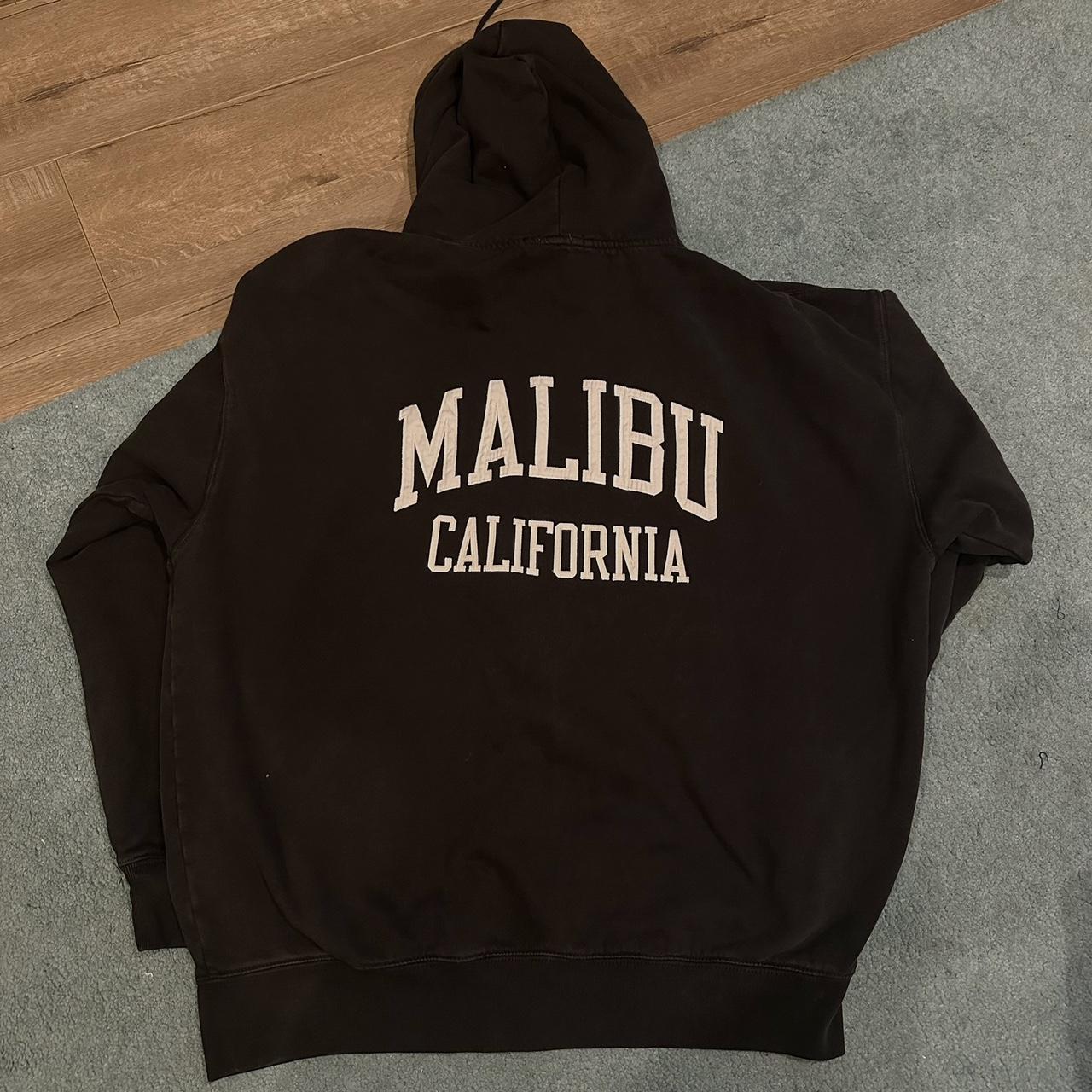 Brandy Melville Christy Hoodie in Black Malibu... Depop