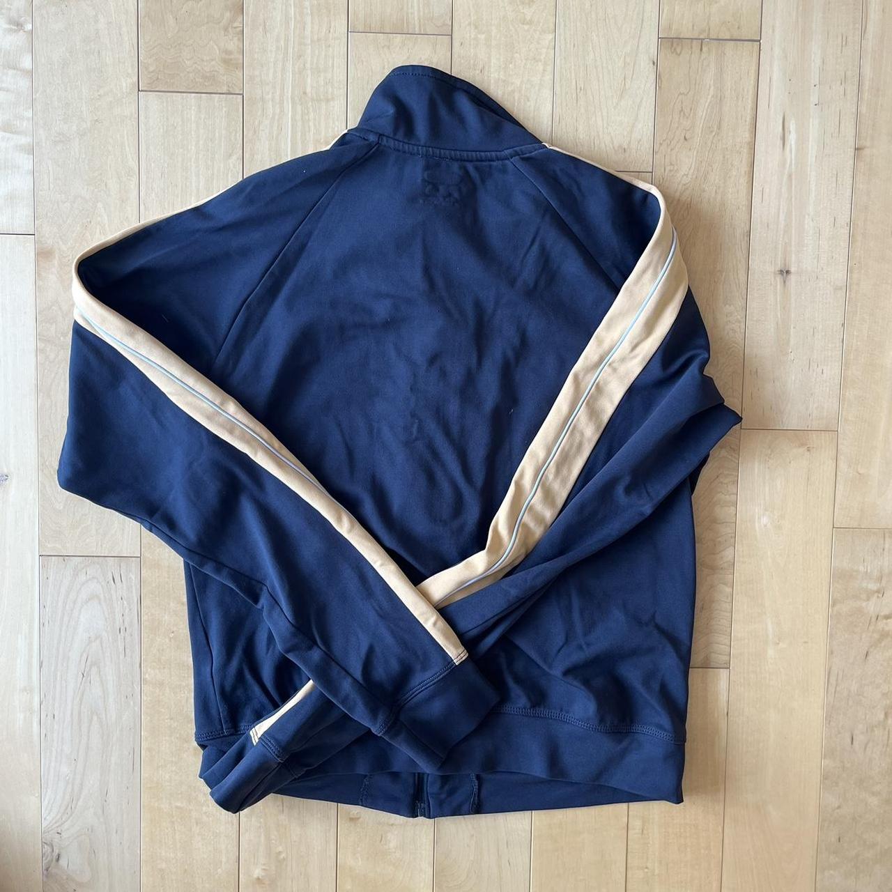 Fila jacket. Sport style. Navy and gold. zip style.... - Depop