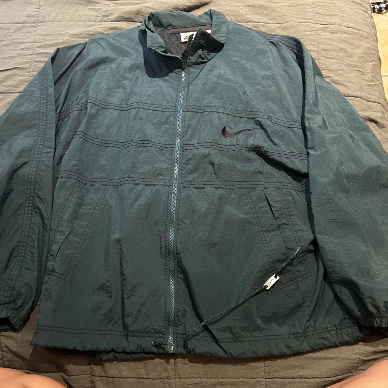 dark green nike windbreaker