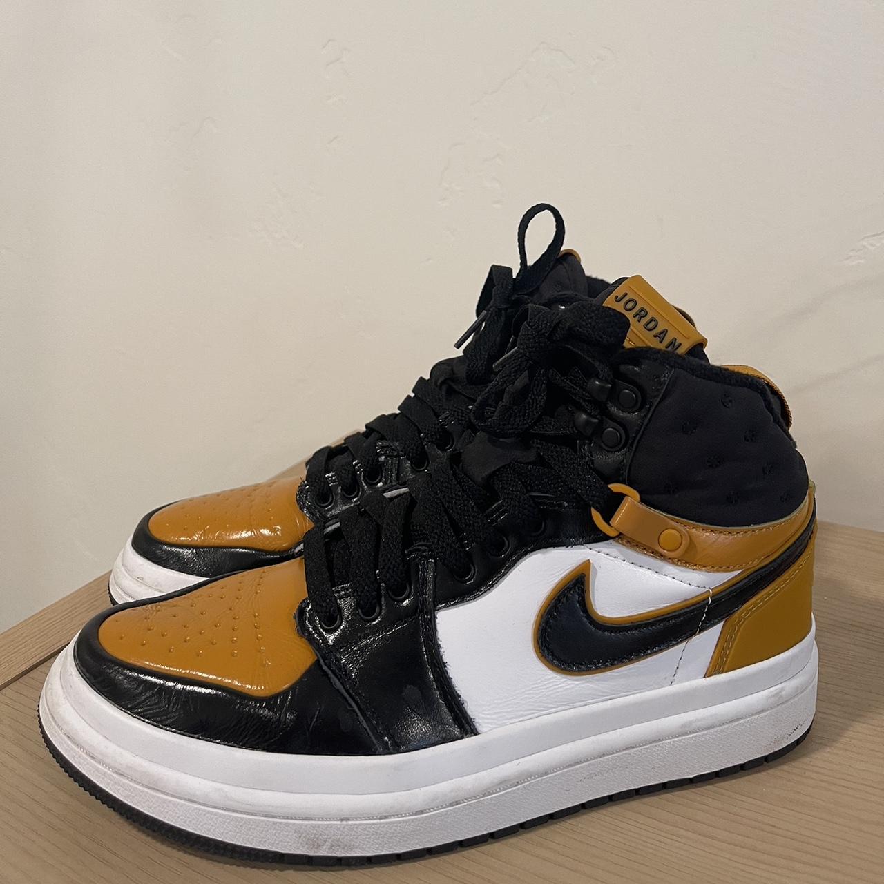 womens gold and black jordans