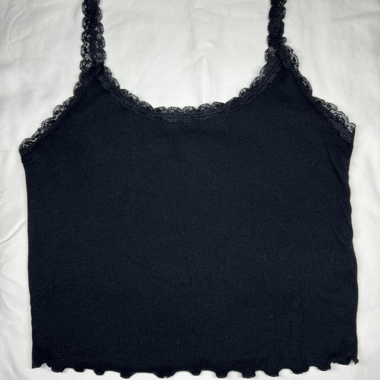 Black tank top with lace straps and lettuce trim on... - Depop