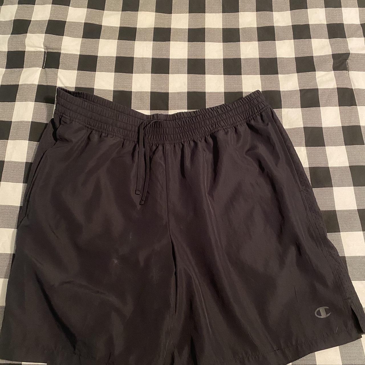 Large Black Champion Athletic shorts, knee