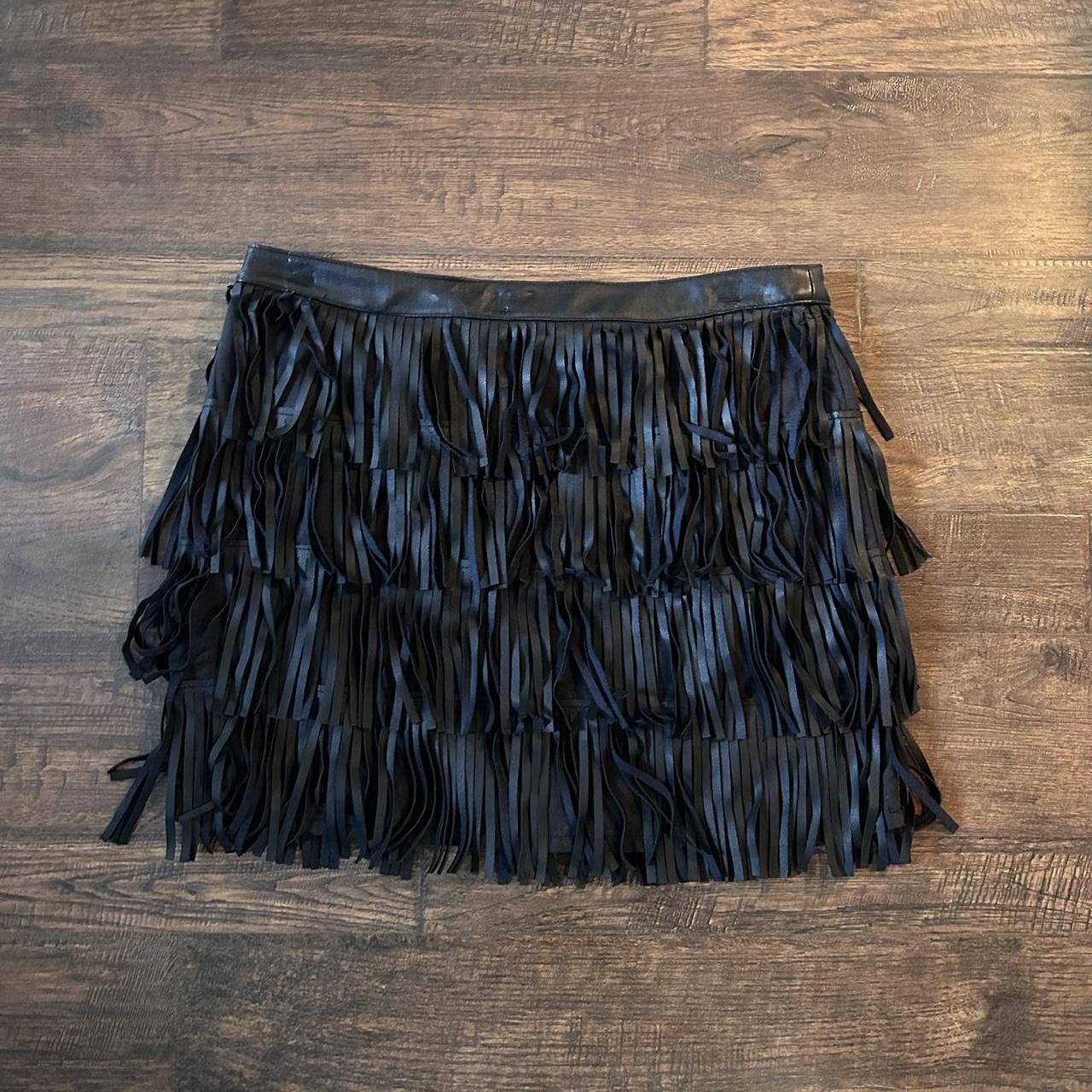 Black faux leather fringe mini skirt barely worn. Depop