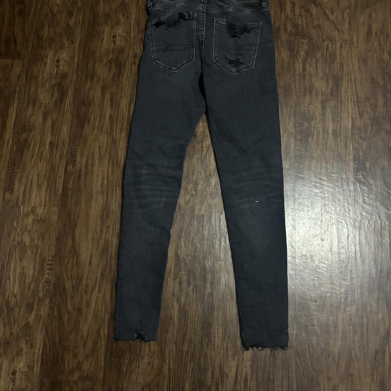 Ripped Black American Eagle stretch skinny jeans