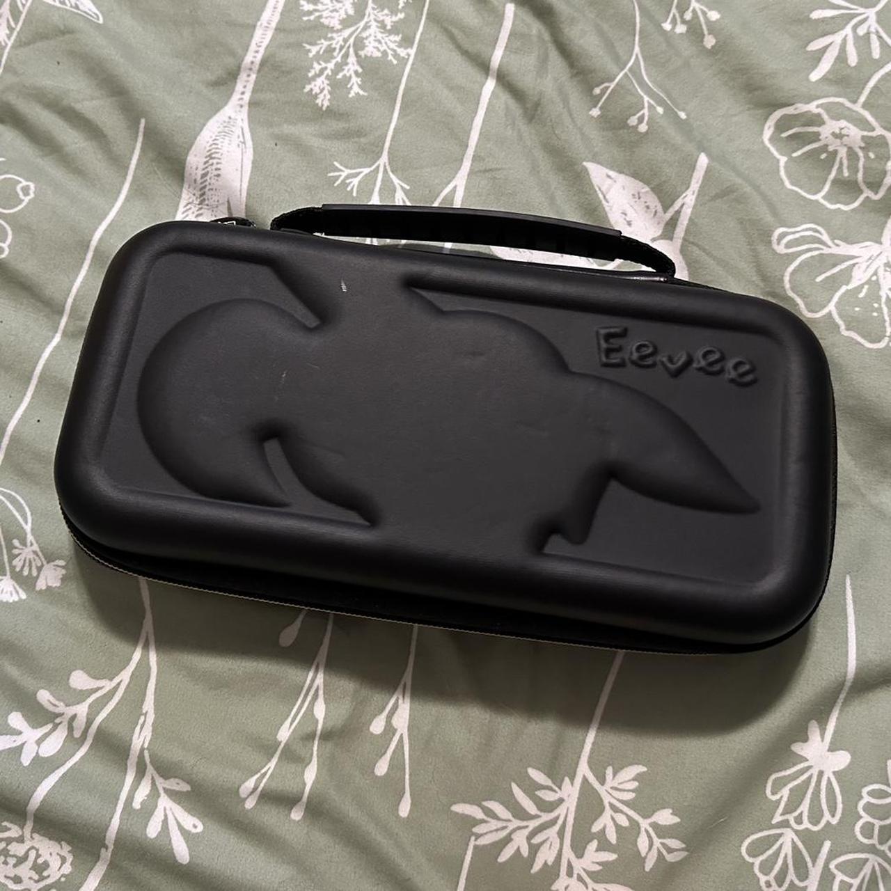 Eevee Pokémon Switch case - black and multicoloured... - Depop