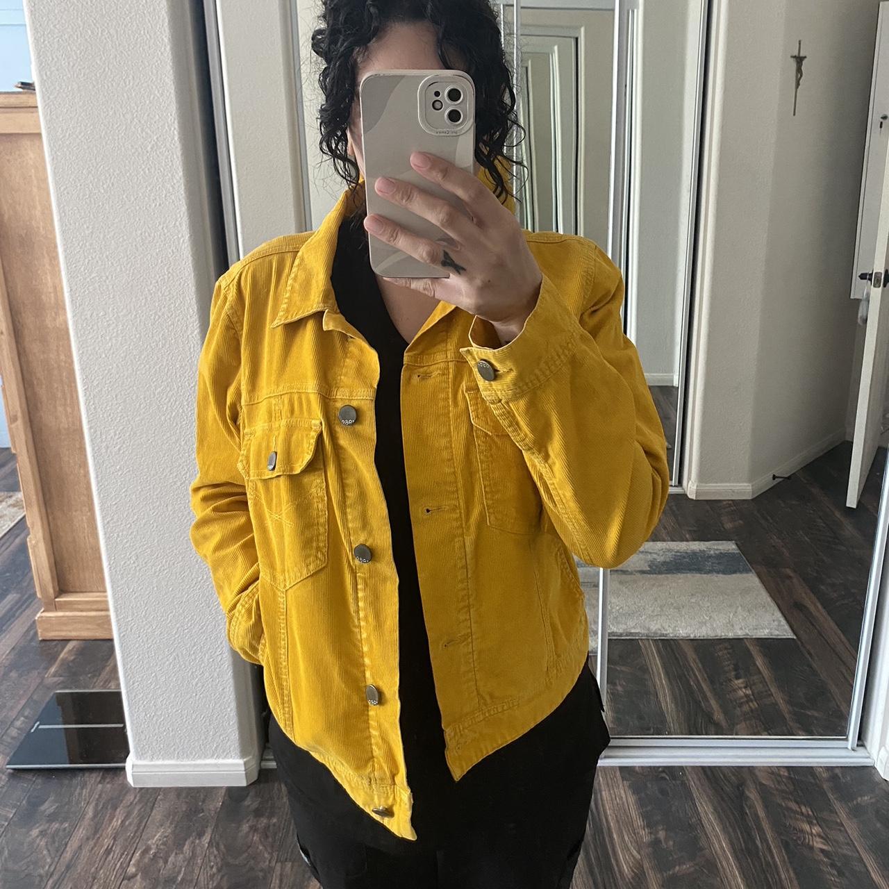 Bright yellow jacket with 6 pockets. 2 on the. Depop