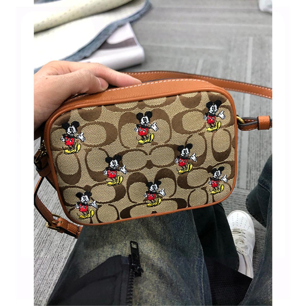 Disney X selling Coach Camera Bag