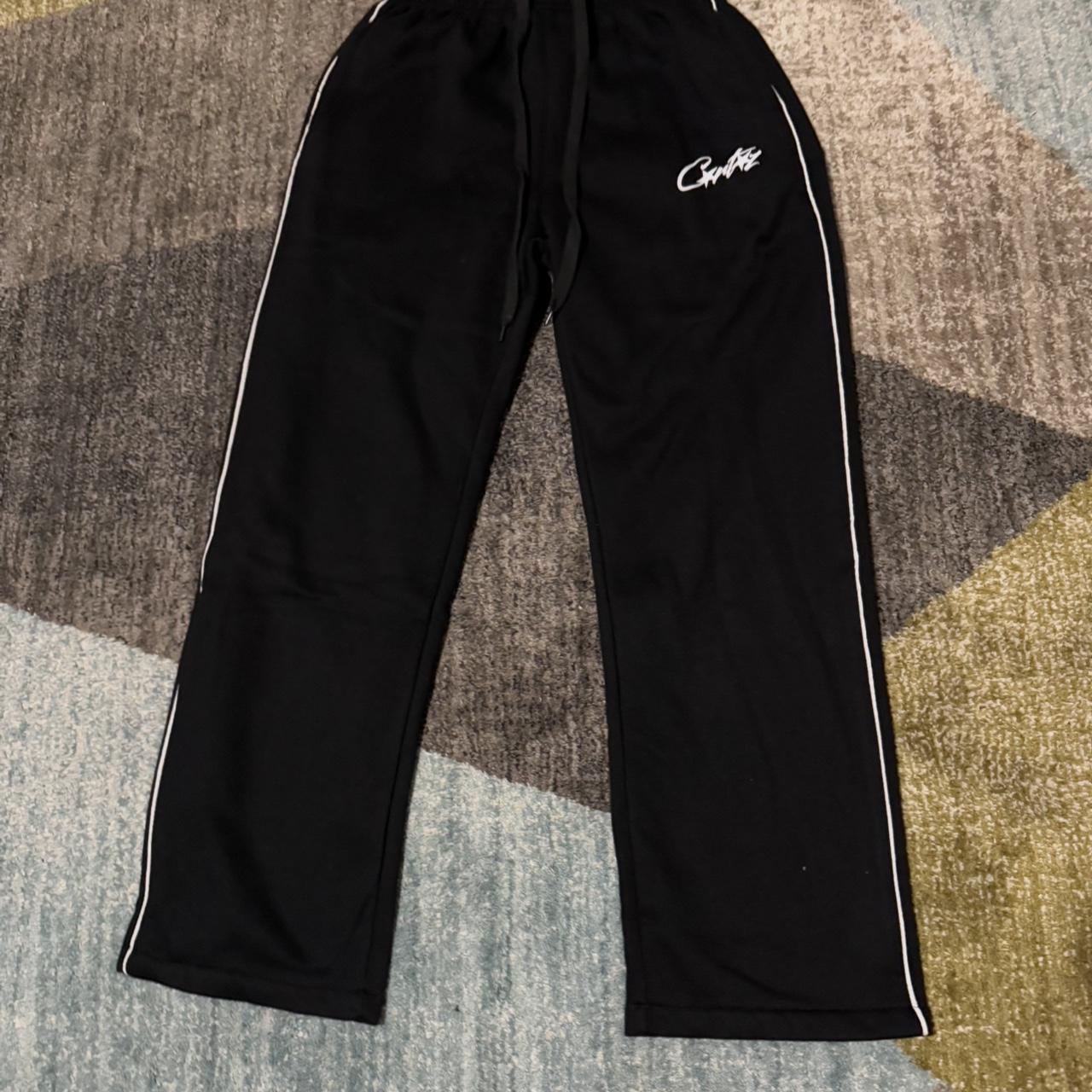 Rep Corteiz Nylon trackpants in black, 3 pockets (1 | Depop