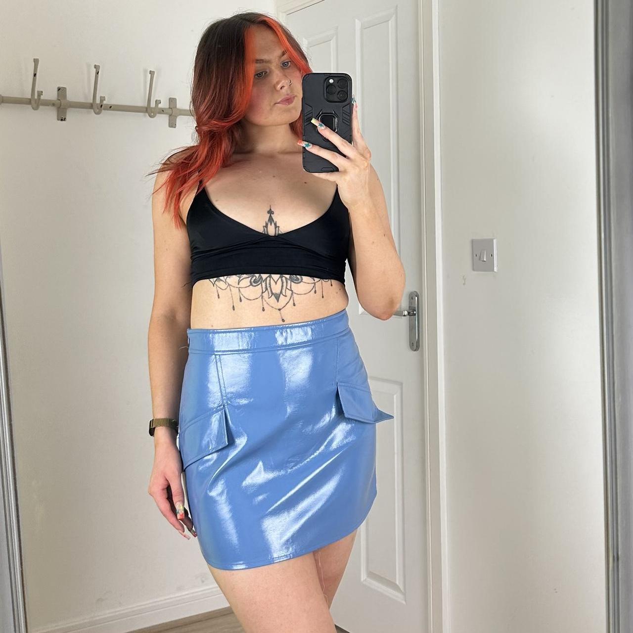 Shiny blue high waisted PVC mini skirt with faux