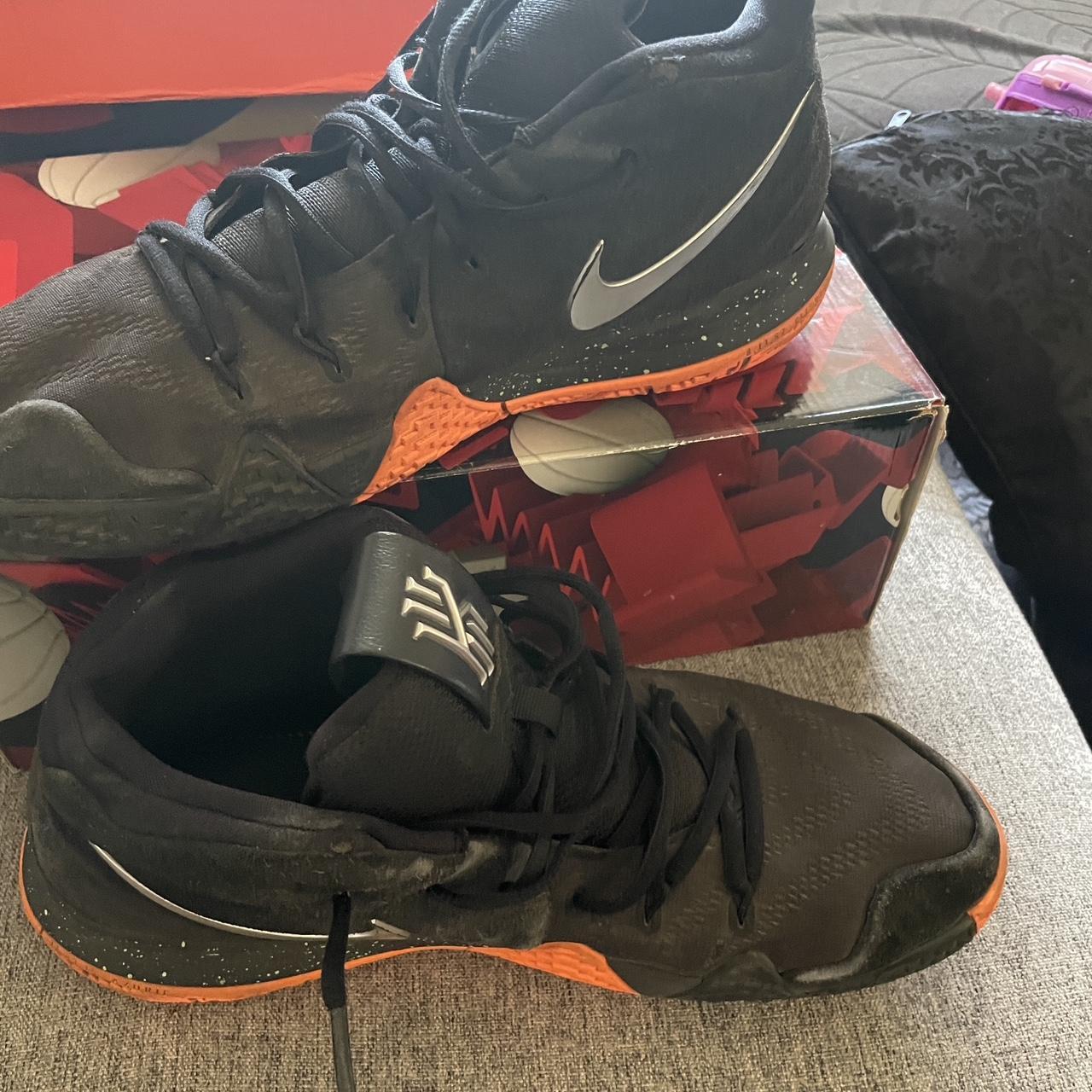 Black and orange kyrie 4 on sale