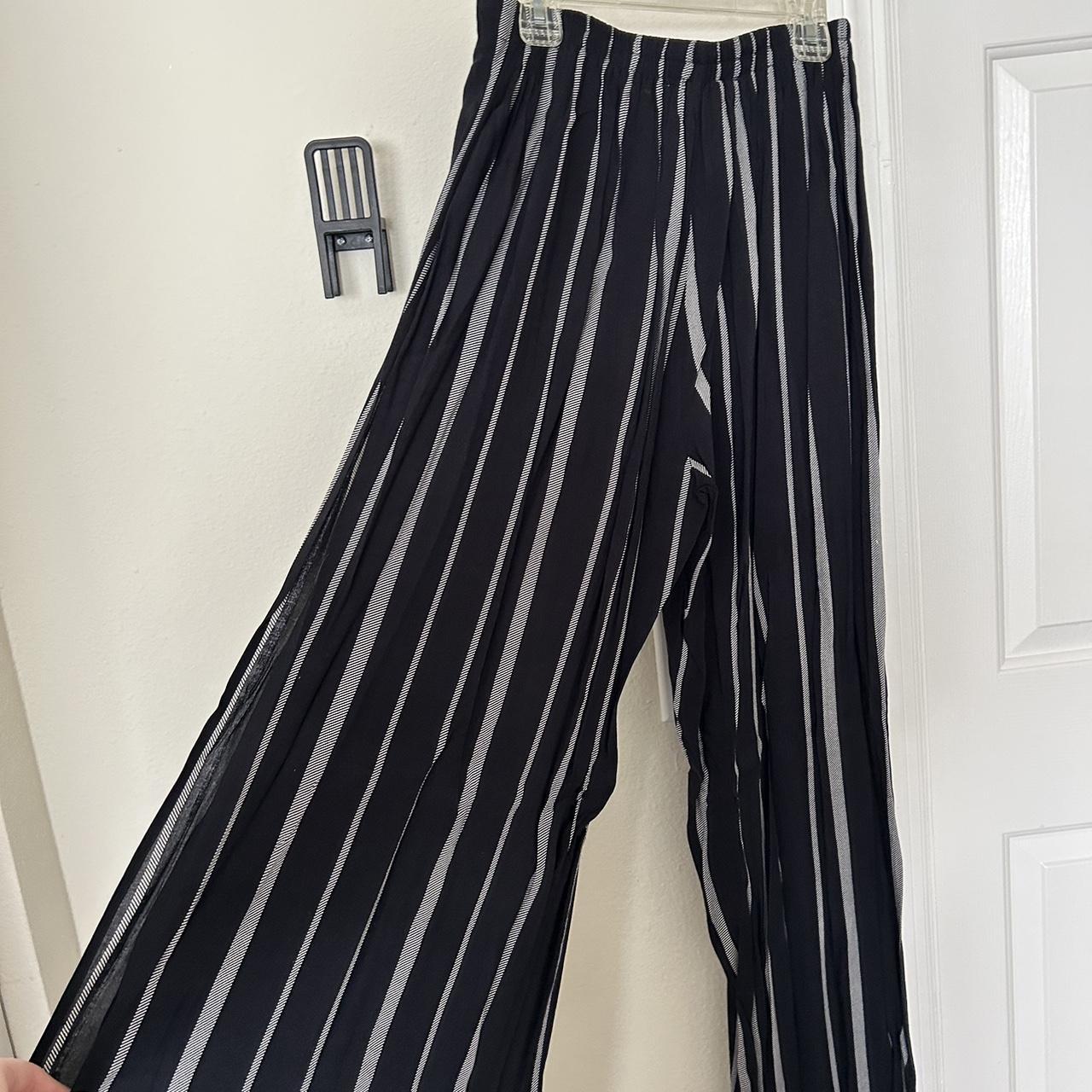 Black and white striped pants with slits on each Depop