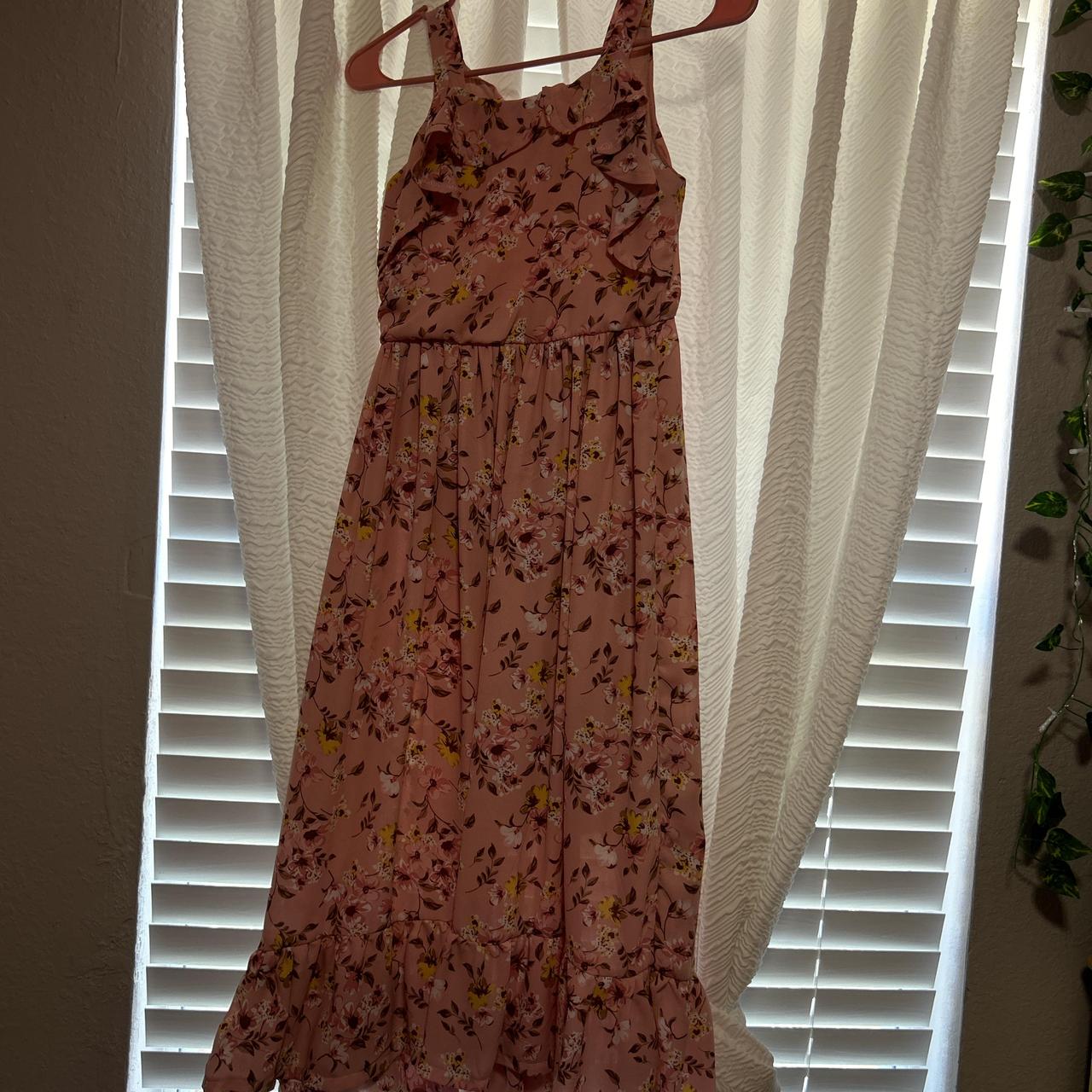 Pink floral fall dress with flow at the bottom