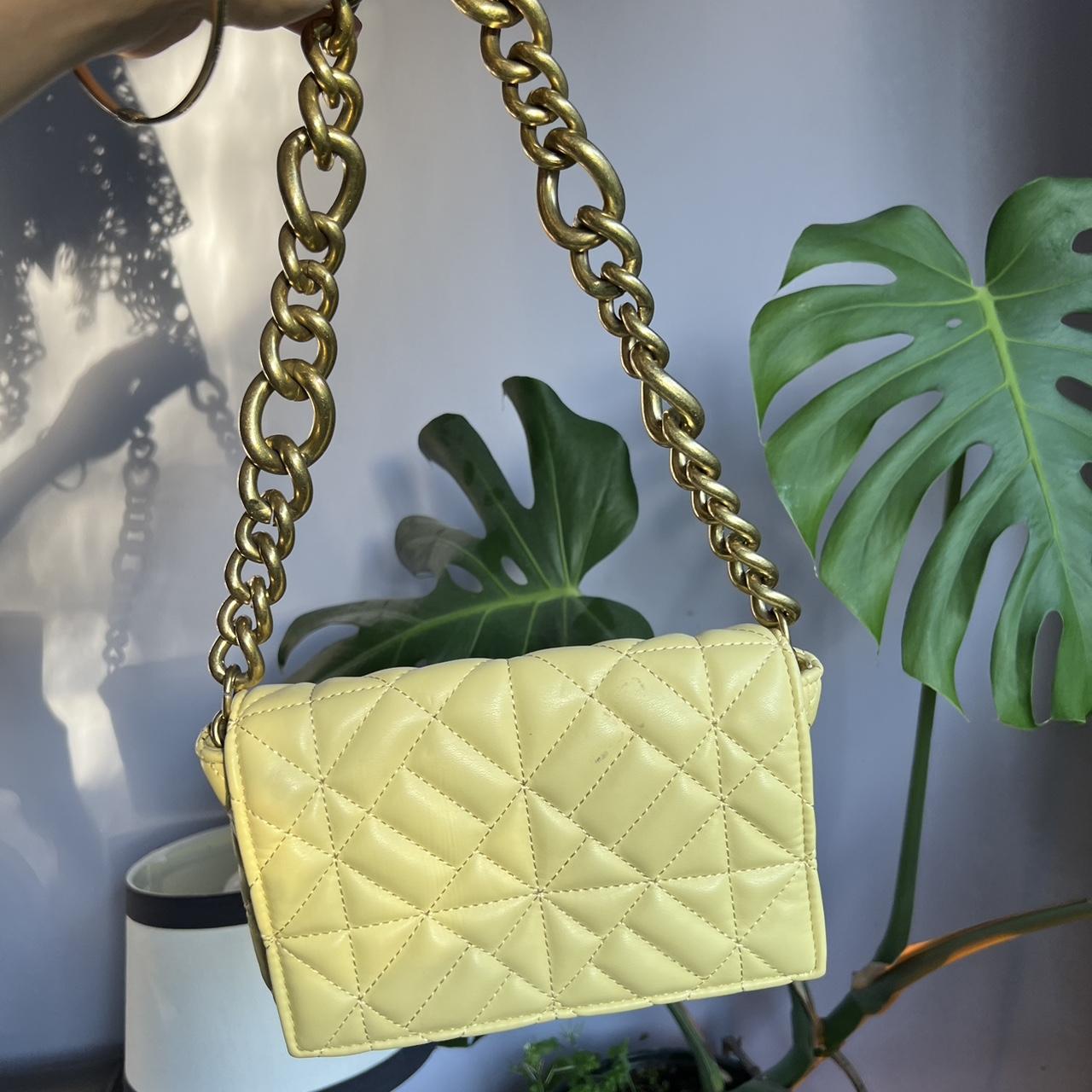 The iconic Zara chain purse in a light yellow. Such... Depop